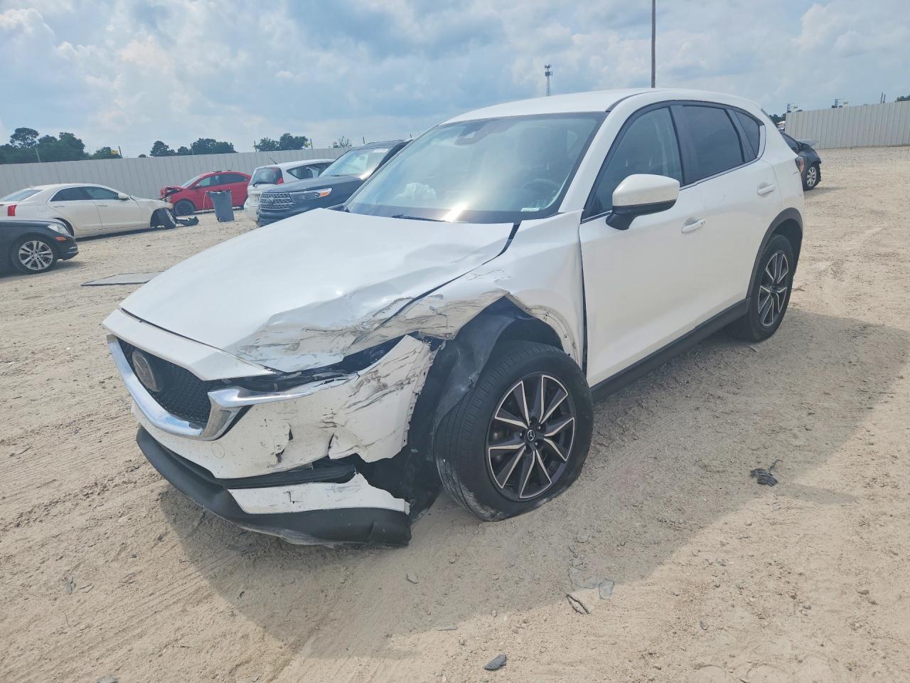 JM3KFACM2J1458878 · 2018 MAZDA CX-5