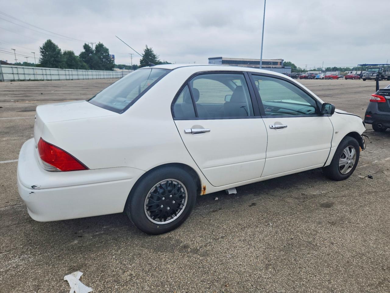 JA3AJ26E02U053016 · 2002 MITSUBISHI LANCER · 3/12