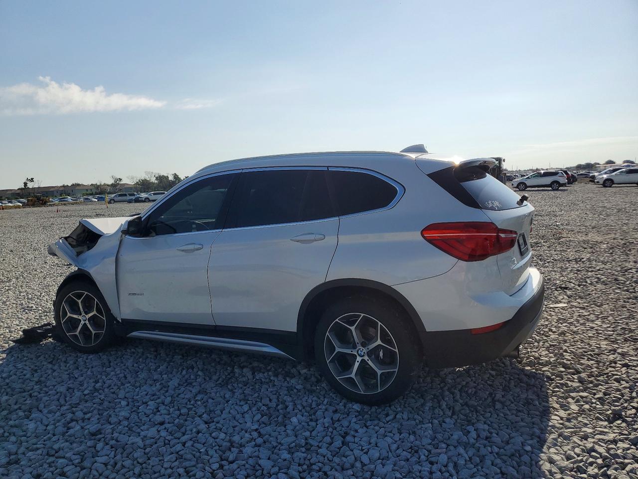 WBXHU7C30H5H34163 · 2017 BMW X1 · 2/12