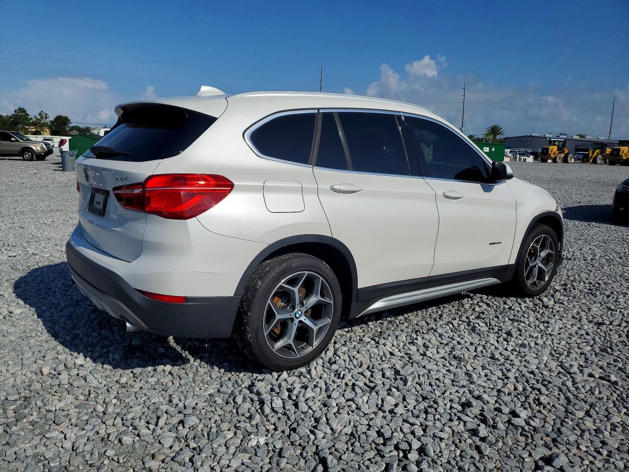 WBXHU7C30H5H34163 · 2017 BMW X1 · 3/12