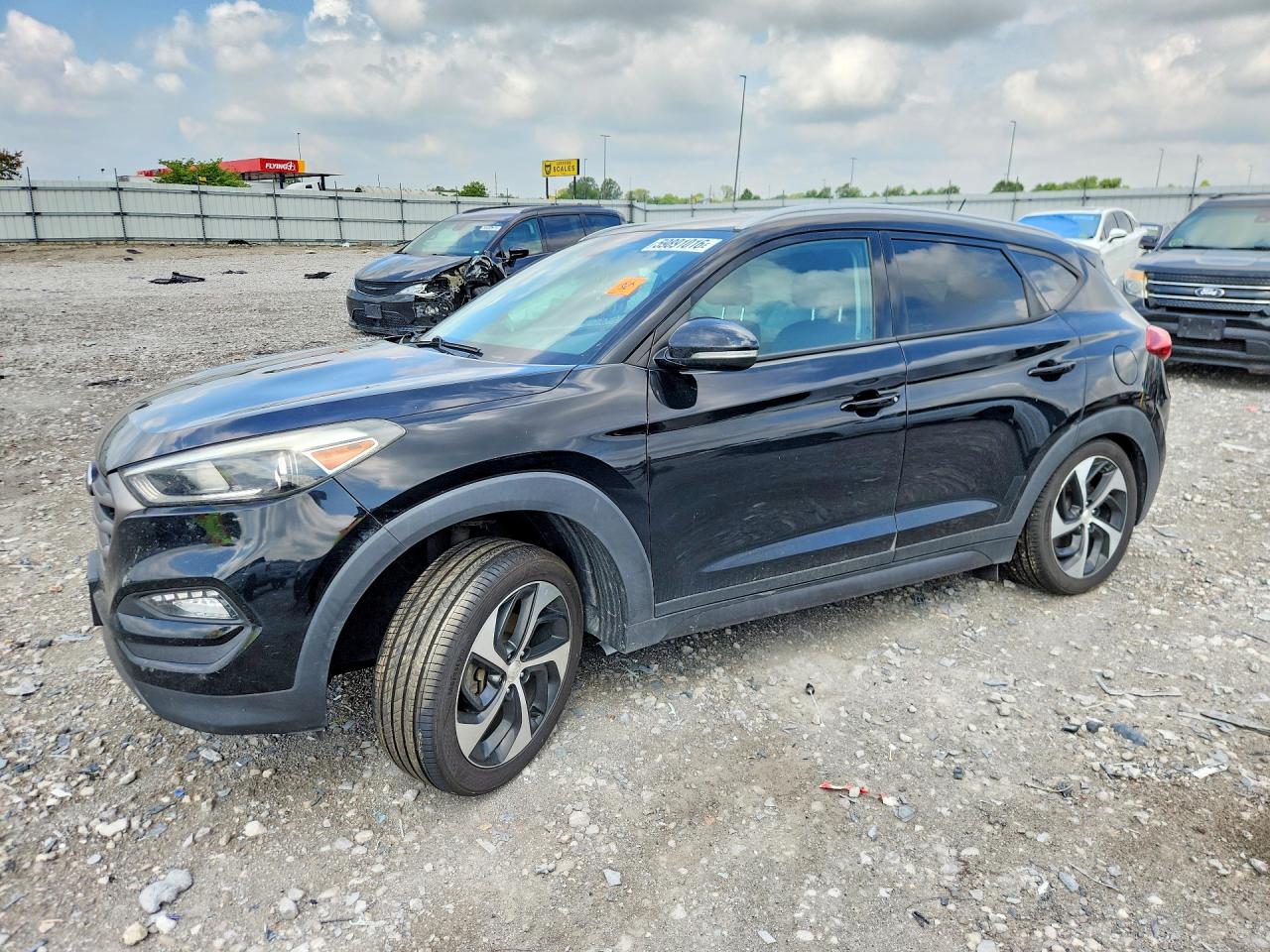 KM8J3CA22GU129434 · 2016 HYUNDAI TUCSON