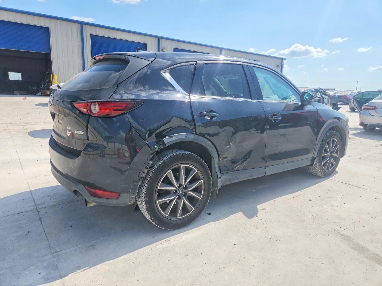 JM3KFADM9J0325894 · 2018 MAZDA CX-5 · 3/14