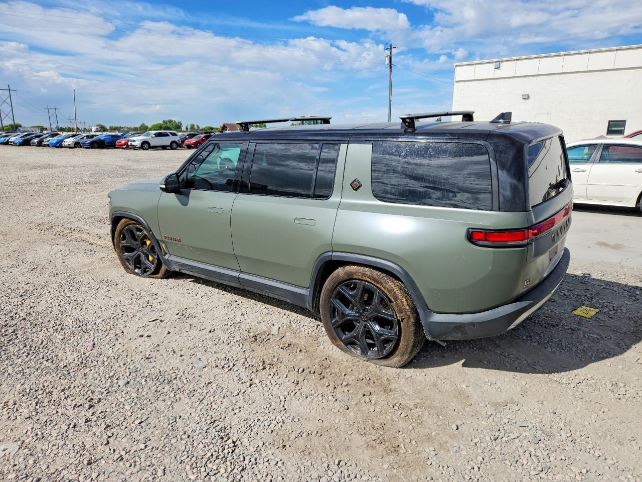 7PDSGABL6PN009440 · 2023 RIVIAN R1S · 2/12