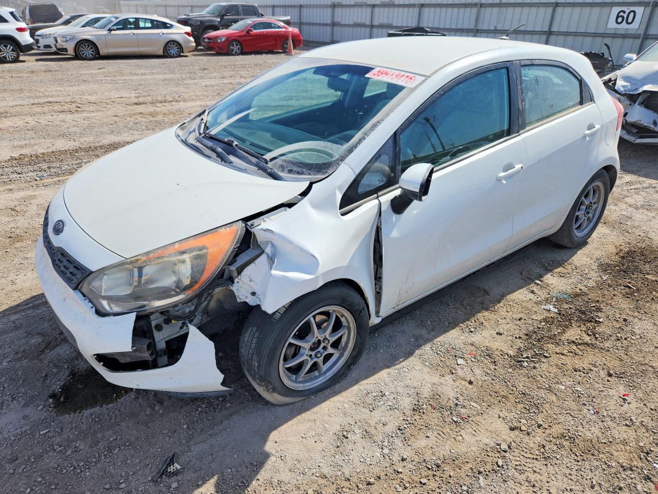 KNADM5A37C6012656 · 2012 KIA RIO