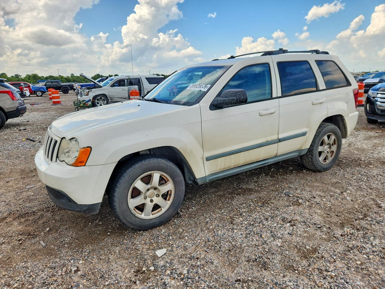 1J8GS48KX9C512634 · 2009 JEEP GRAND CHEROKEE