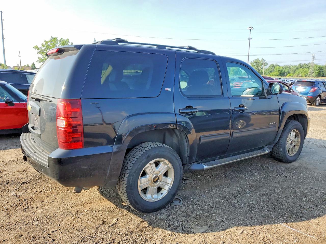 1GNSKBE09ER141473 · 2014 CHEVROLET TAHOE · 3/13
