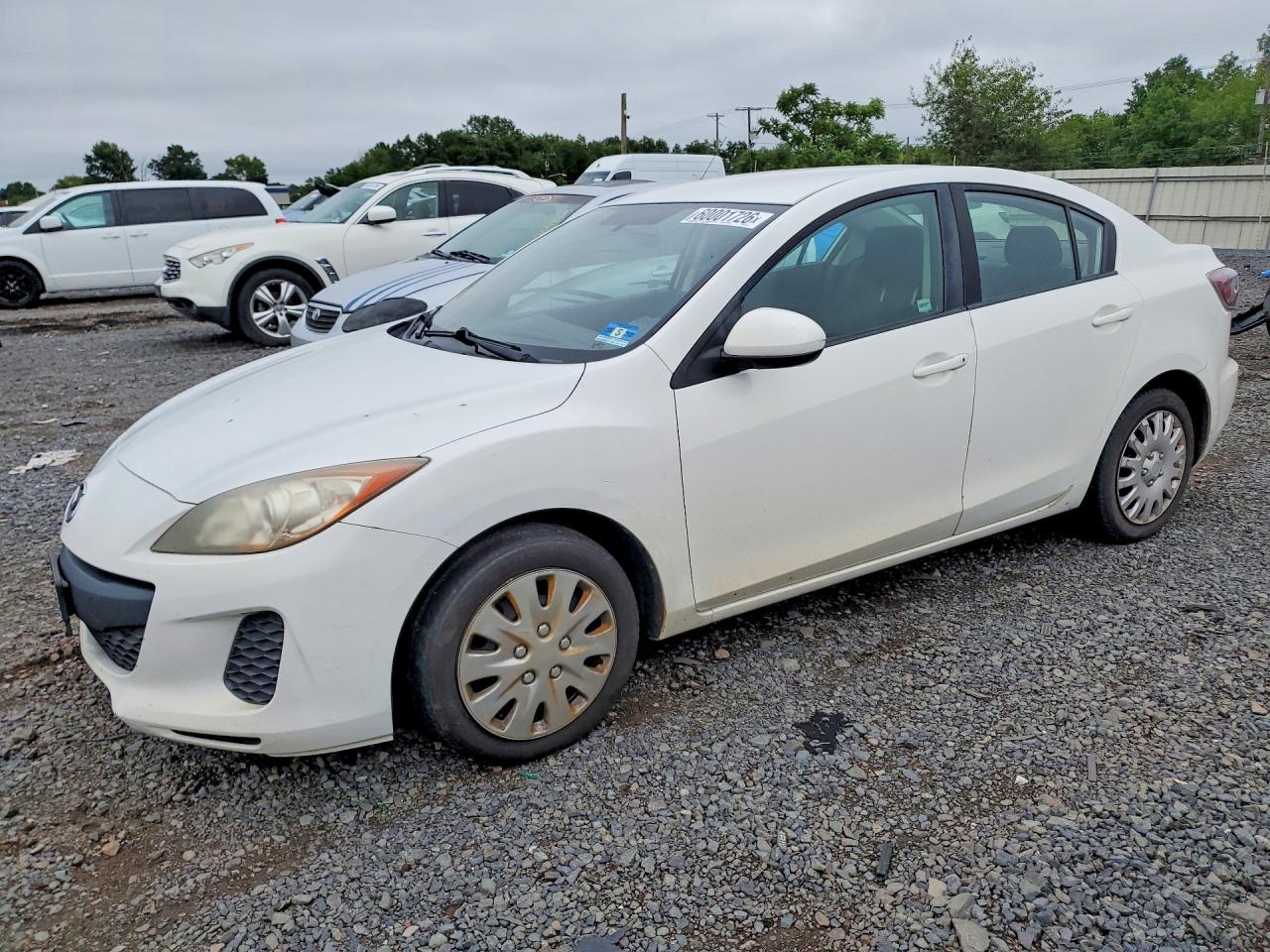 JM1BL1UG2C1520311 · 2012 MAZDA 3