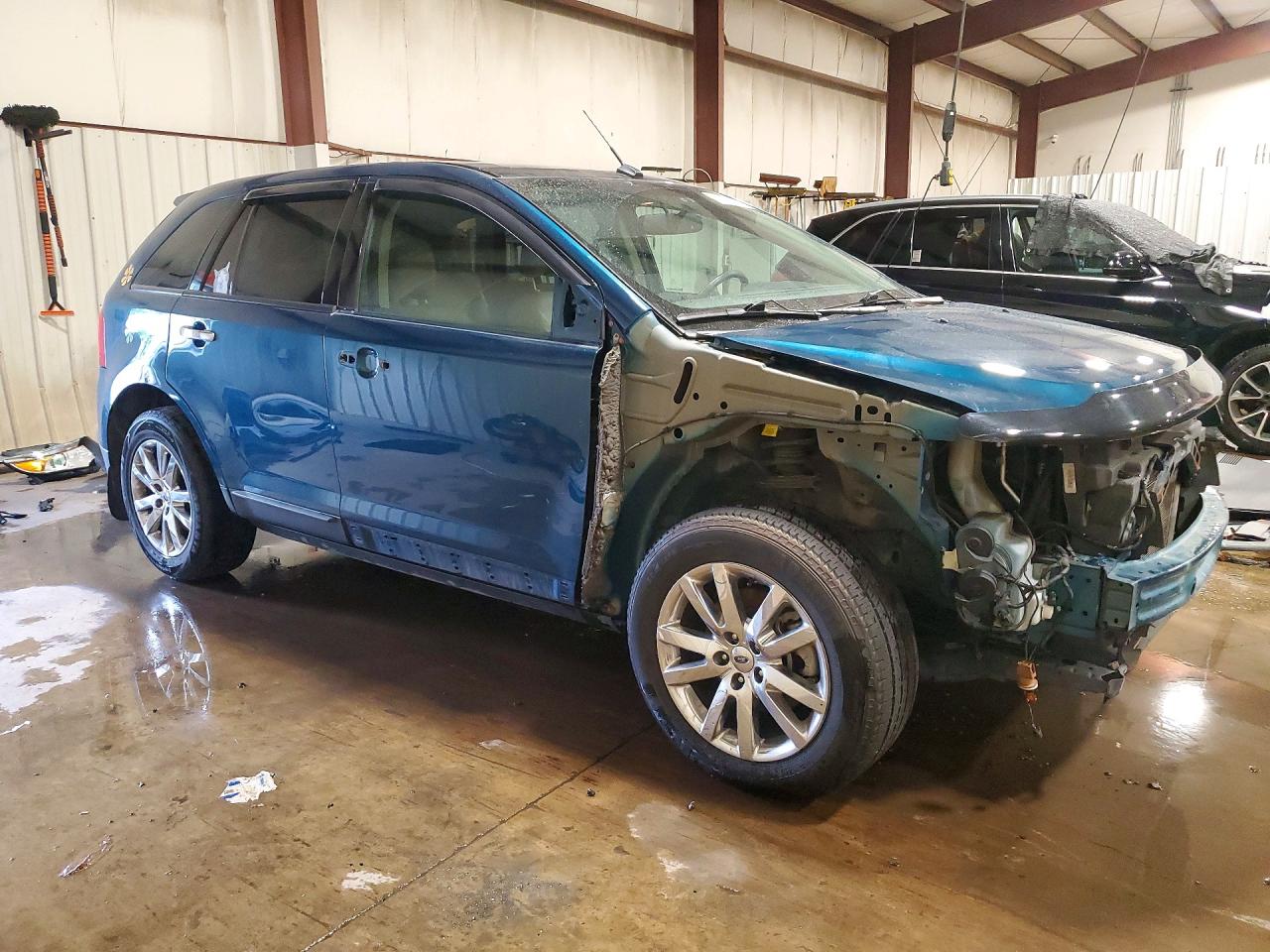 2FMDK4JC1BBB49705 · 2011 FORD EDGE · 4/14