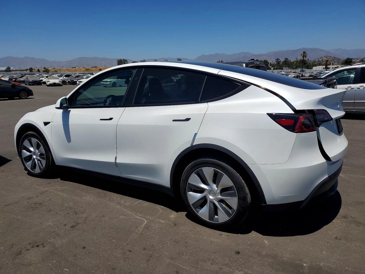 7SAYGDEE8PF857899 · 2023 TESLA MODEL Y · 2/12