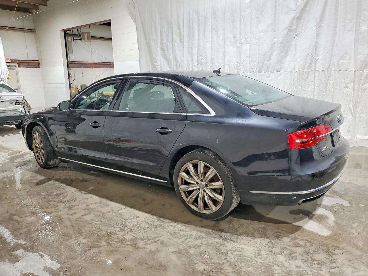 WAU34AFD5GN014438 · 2016 AUDI A8 · 2/12