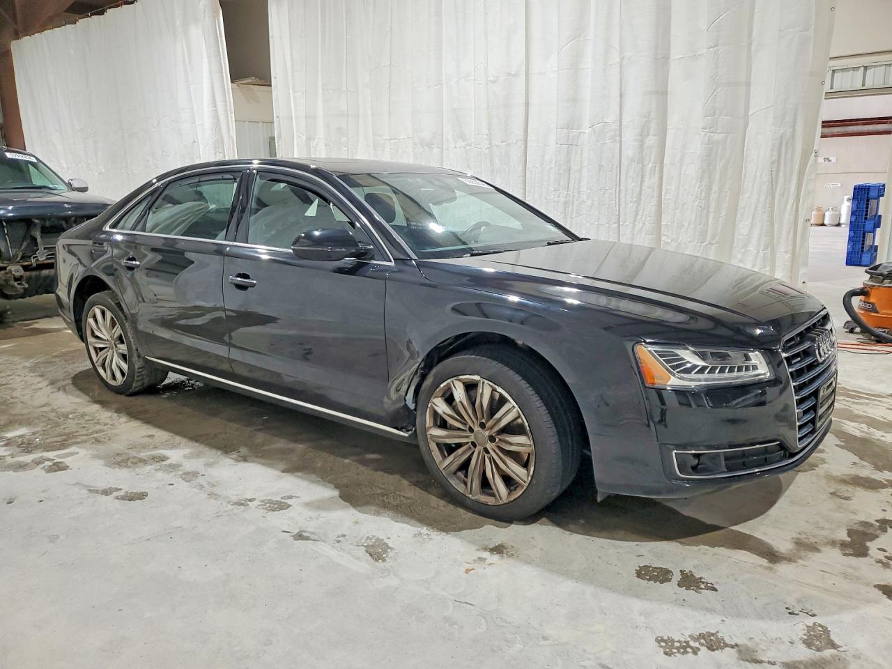 WAU34AFD5GN014438 · 2016 AUDI A8 · 4/12