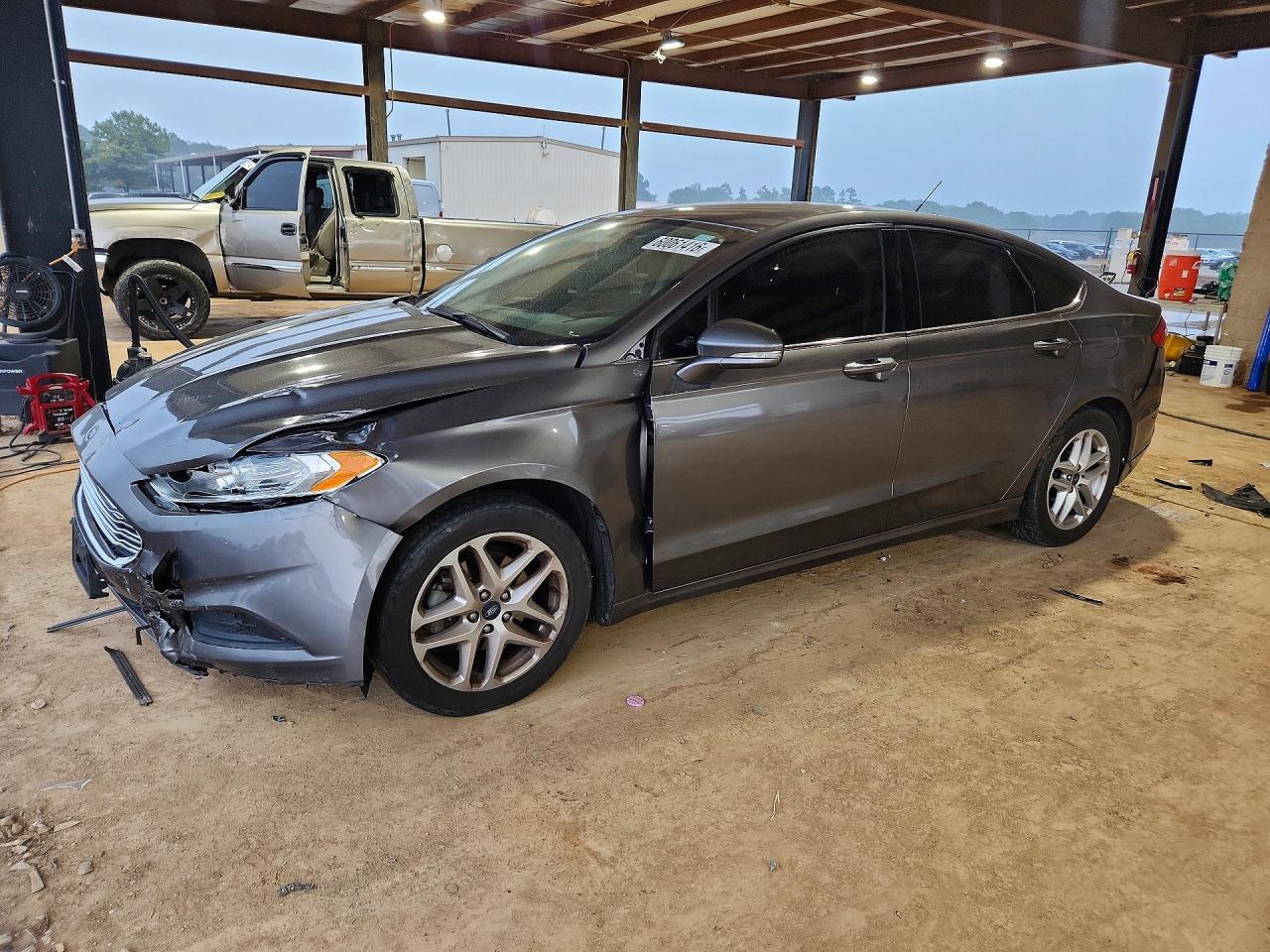 1FA6P0H73E5369751 · 2014 FORD FUSION SE