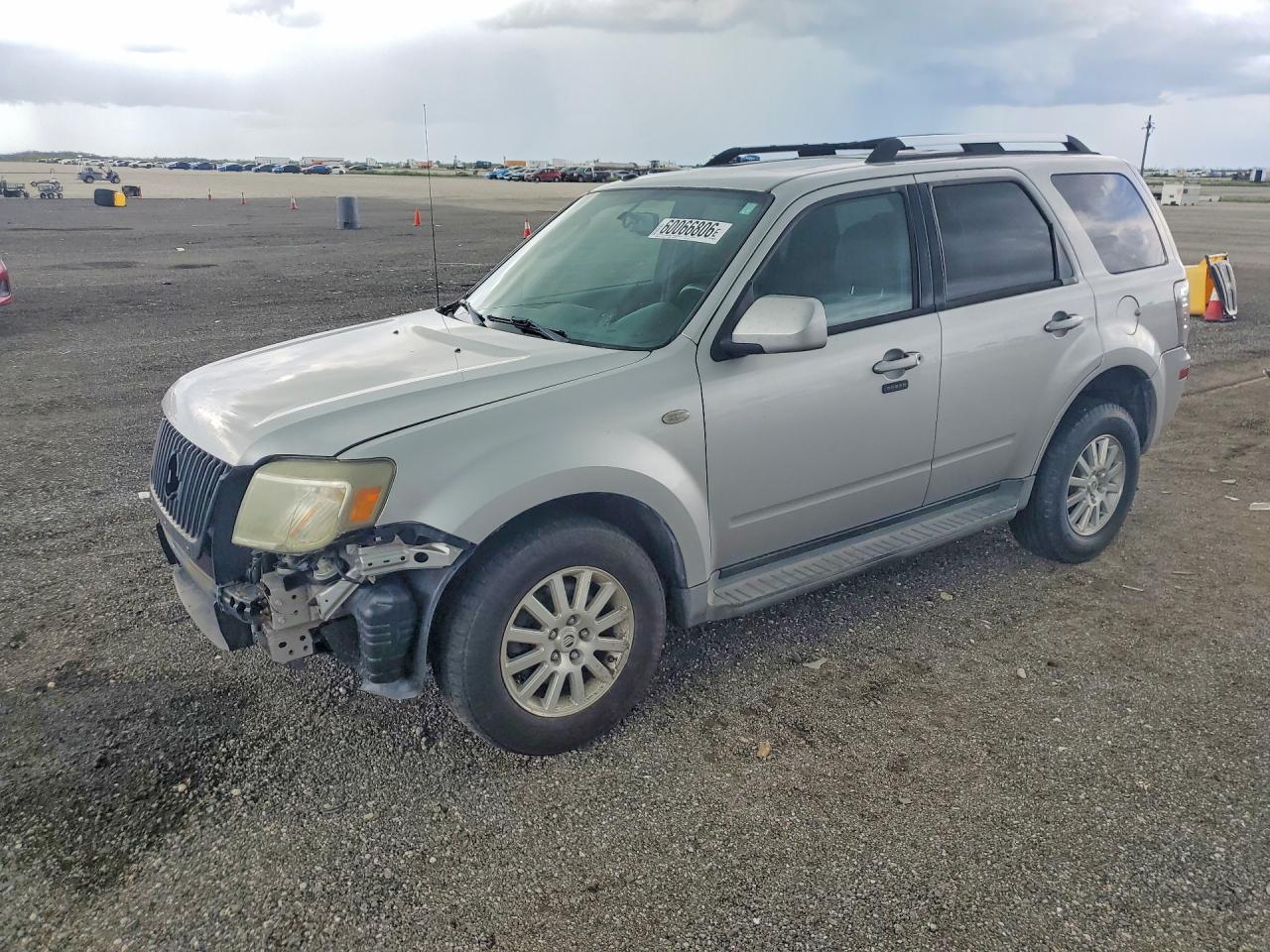 4M2CU97719KJ16909 · 2009 MERCURY MARINER