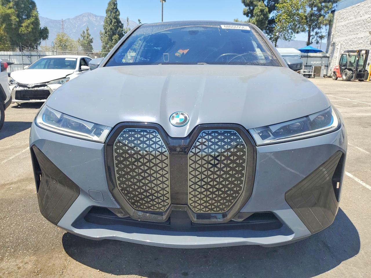 WB533CF0XRCN35342 · 2024 BMW IX · 5/14