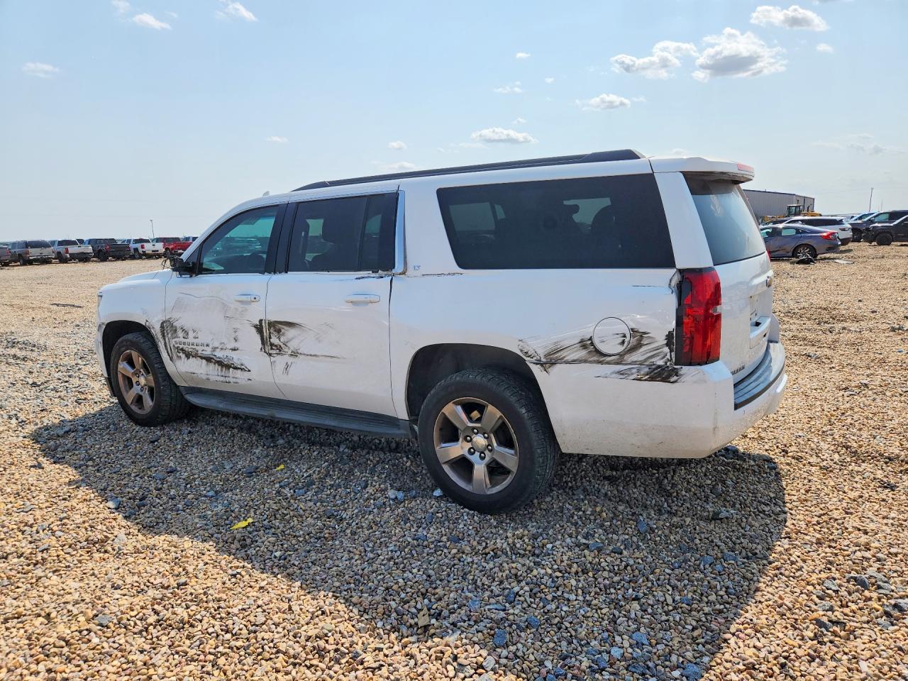 1GNSCHKC4KR265760 · 2019 CHEVROLET SUBURBAN · 2/13