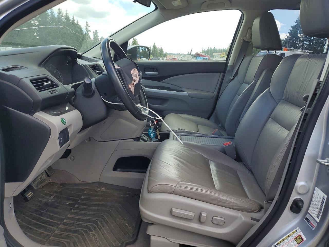 JHLRM4H75CC019878 · 2012 HONDA CR-V · 7/13