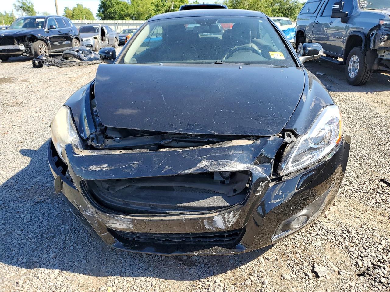 YV1672MC6DJ139923 · 2013 VOLVO C70 · 5/12