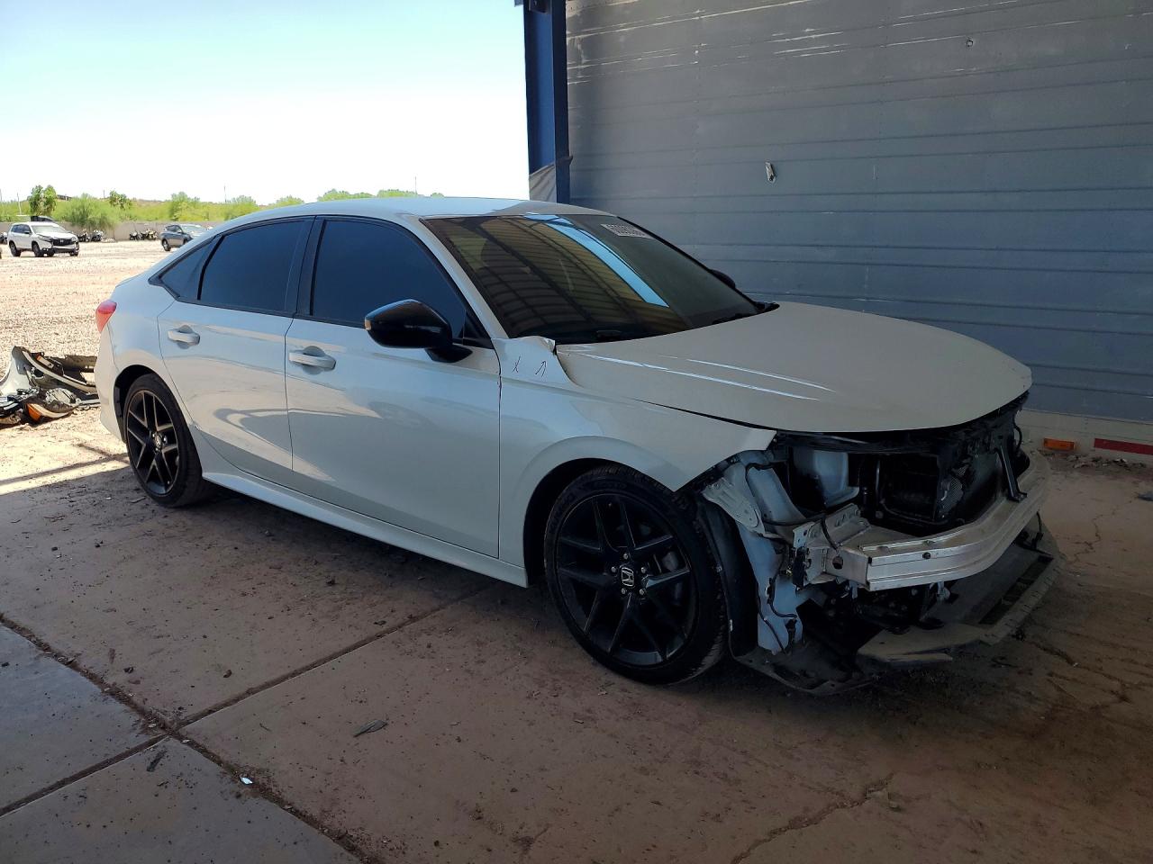 2HGFE2F51PH547232 · 2023 HONDA CIVIC · 4/13