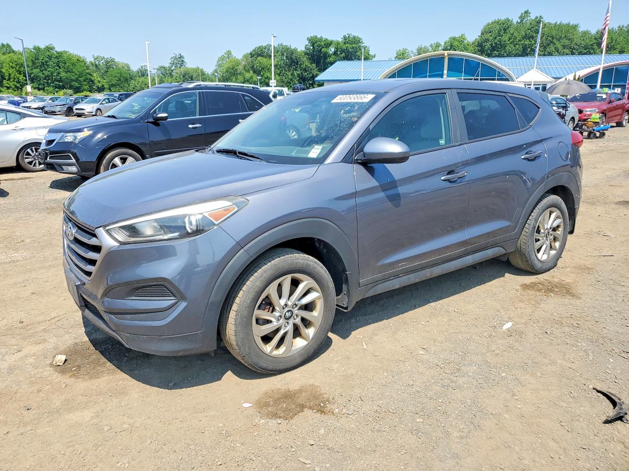 KM8J2CA40JU635324 · 2018 HYUNDAI TUCSON