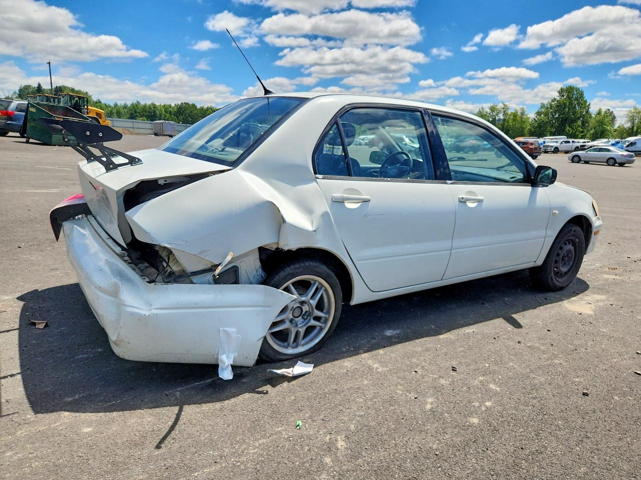 JA3AJ26E12U020400 · 2002 MITSUBISHI LANCER · 3/12