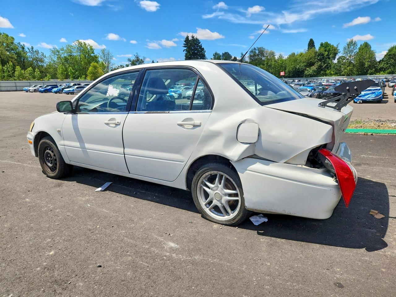 JA3AJ26E12U020400 · 2002 MITSUBISHI LANCER · 2/12