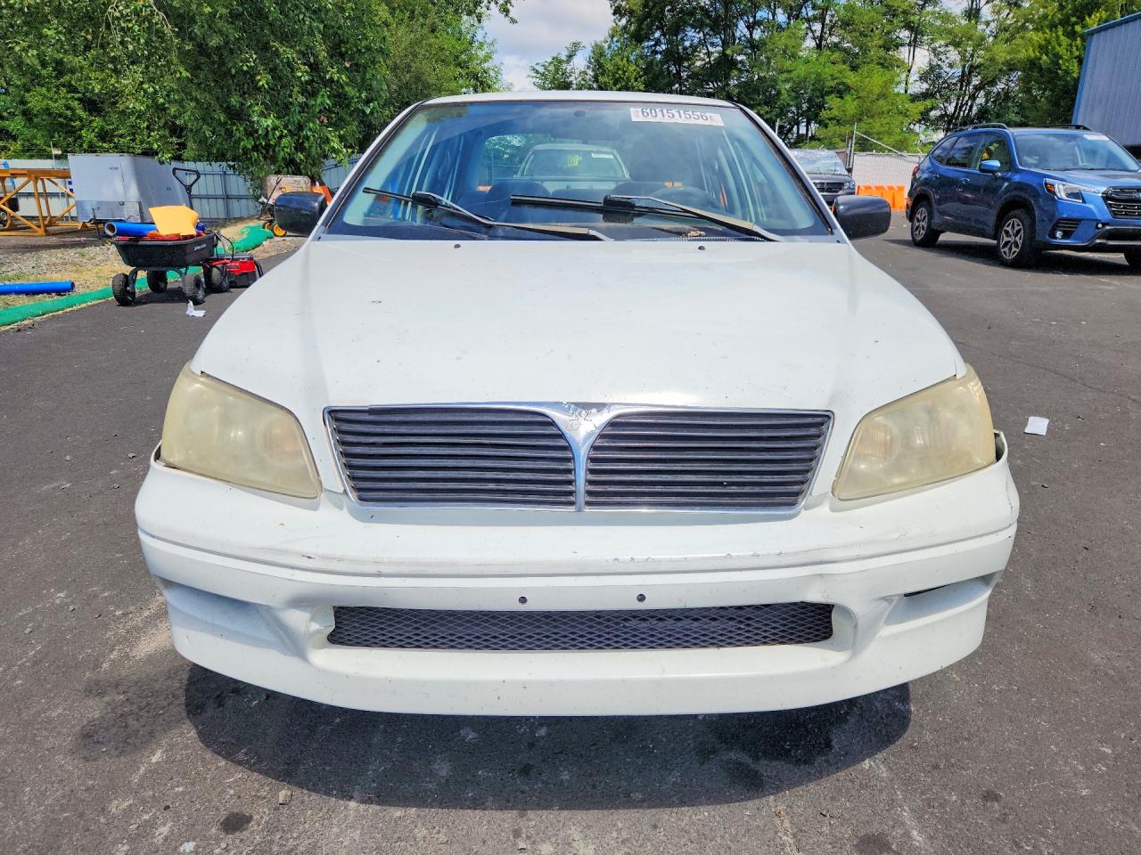 JA3AJ26E12U020400 · 2002 MITSUBISHI LANCER · 5/12