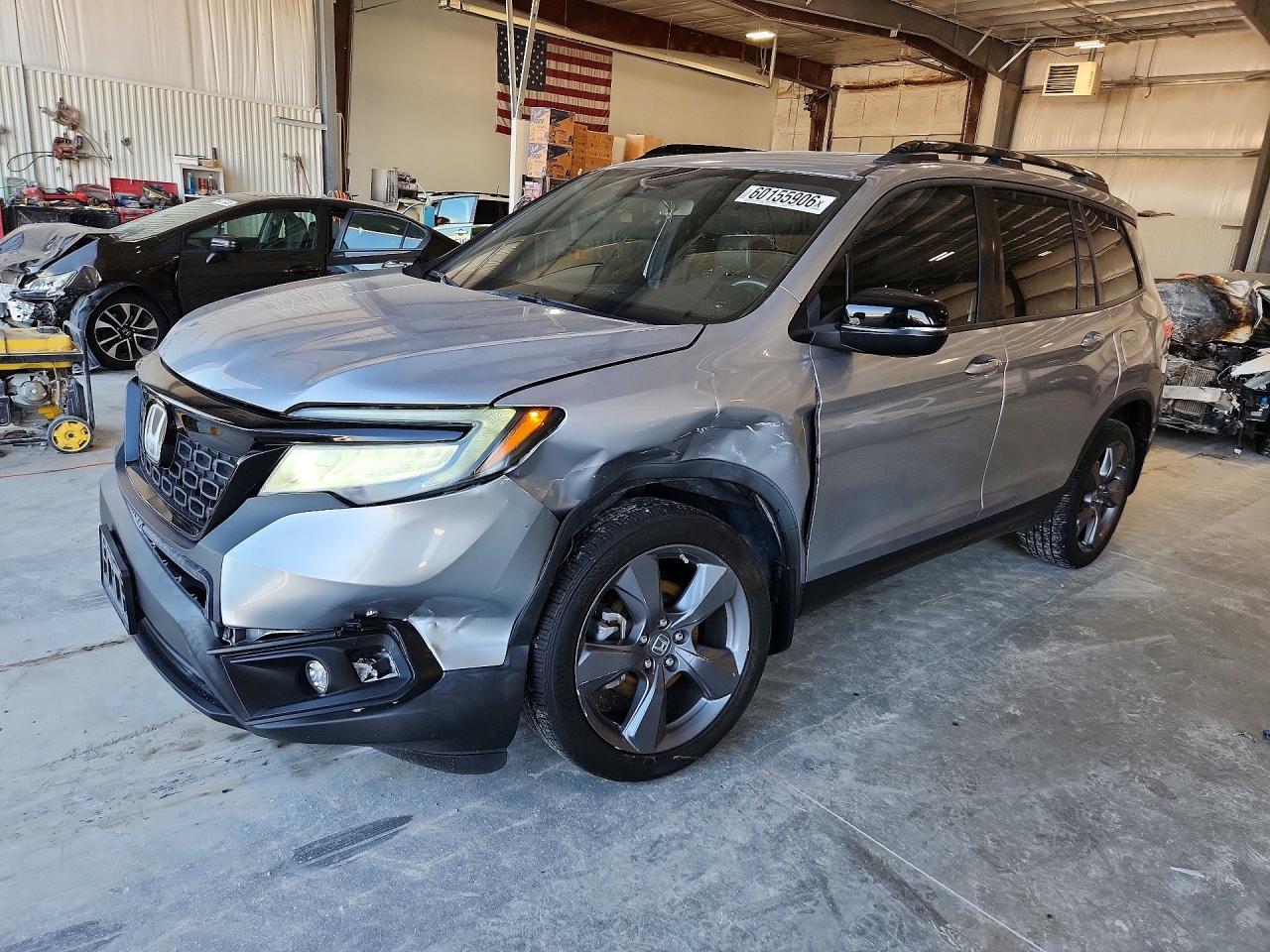 5FNYF7H97KB000403 · 2019 HONDA PASSPORT