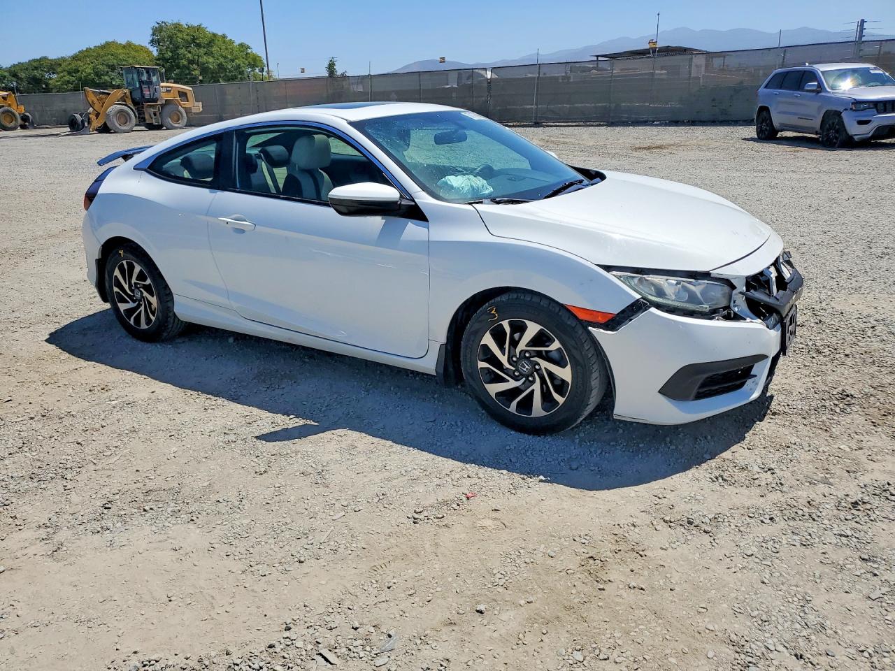 2HGFC4B05JH308527 · 2018 HONDA CIVIC · 4/12