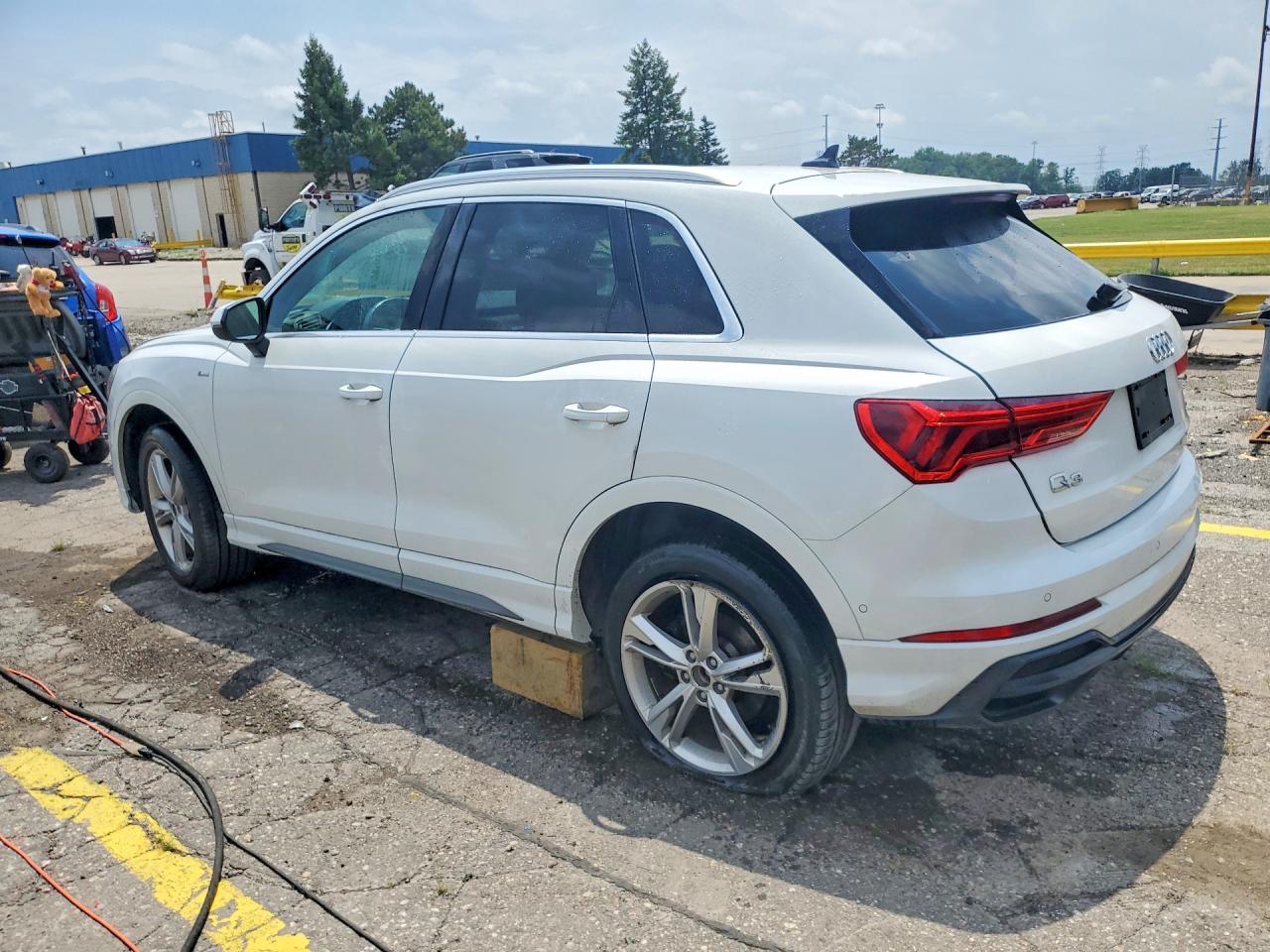 WA1EECF31M1014820 · 2021 AUDI Q3 · 2/14