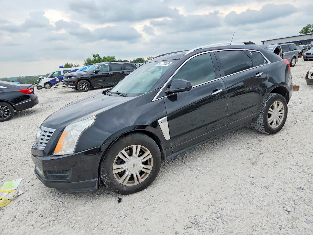 3GYFNBE30FS619915 · 2015 CADILLAC SRX
