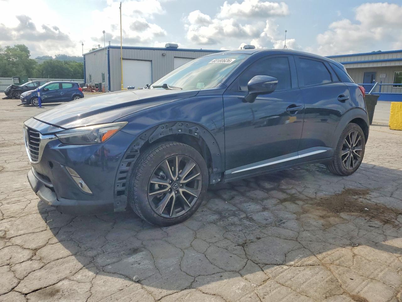 JM1DKBD7XG0111941 · 2016 MAZDA CX-3