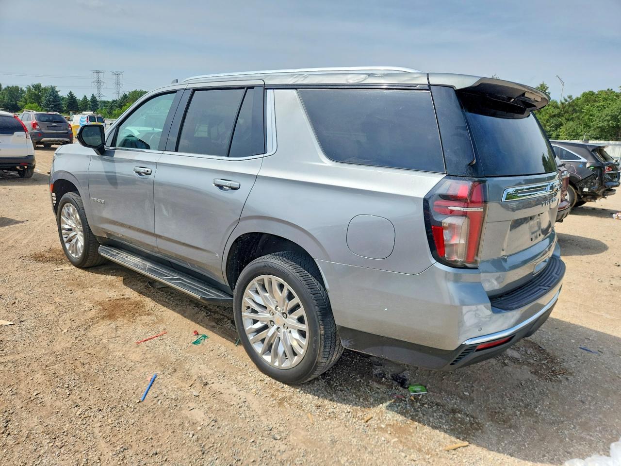 1GNSKMKD7RR135017 · 2024 CHEVROLET TAHOE · 2/12