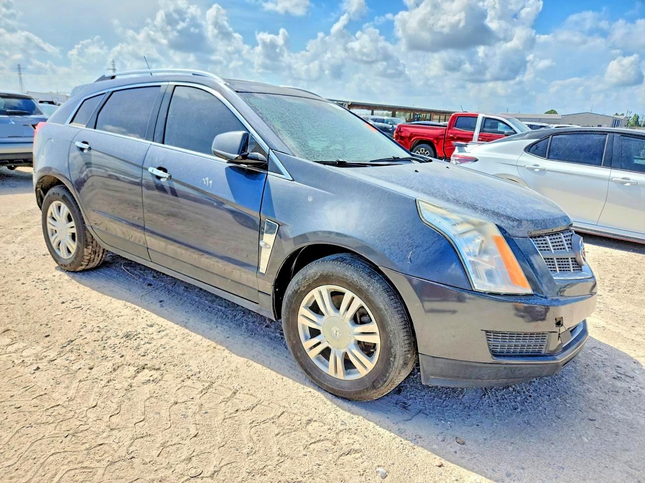 3GYFNDEYXBS641227 · 2011 CADILLAC SRX · 4/13