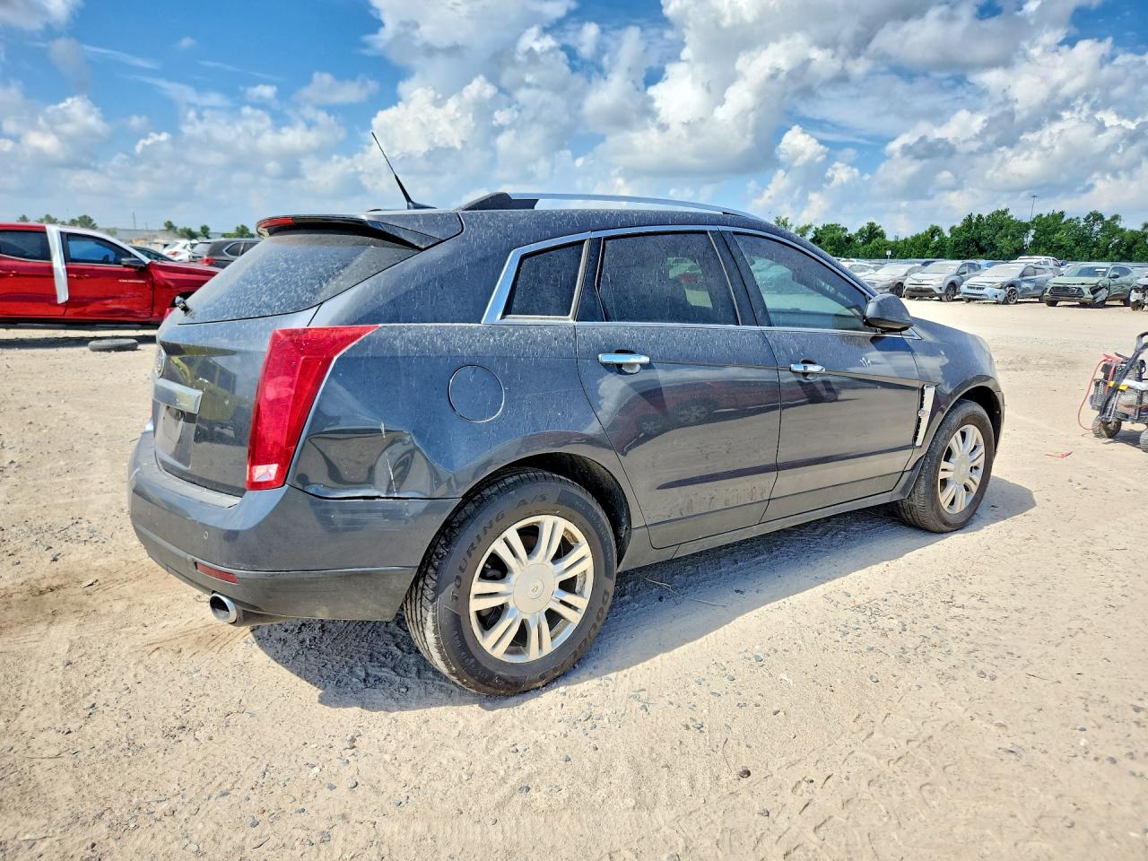 3GYFNDEYXBS641227 · 2011 CADILLAC SRX · 3/13
