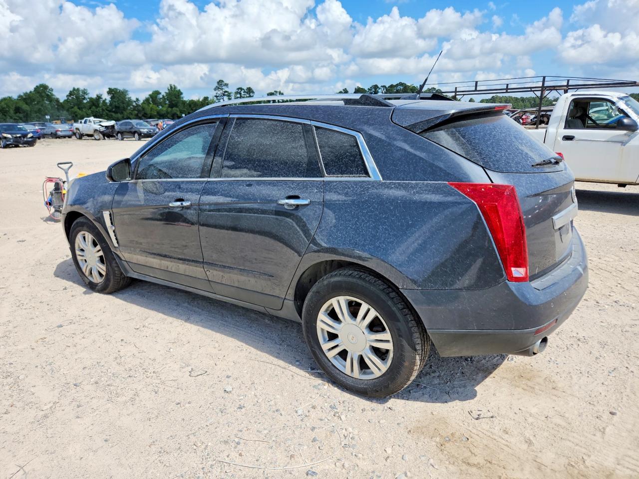 3GYFNDEYXBS641227 · 2011 CADILLAC SRX · 2/13