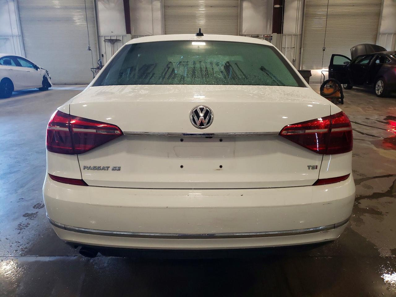 1VWBT7A38HC083055 · 2017 VOLKSWAGEN PASSAT · 6/13
