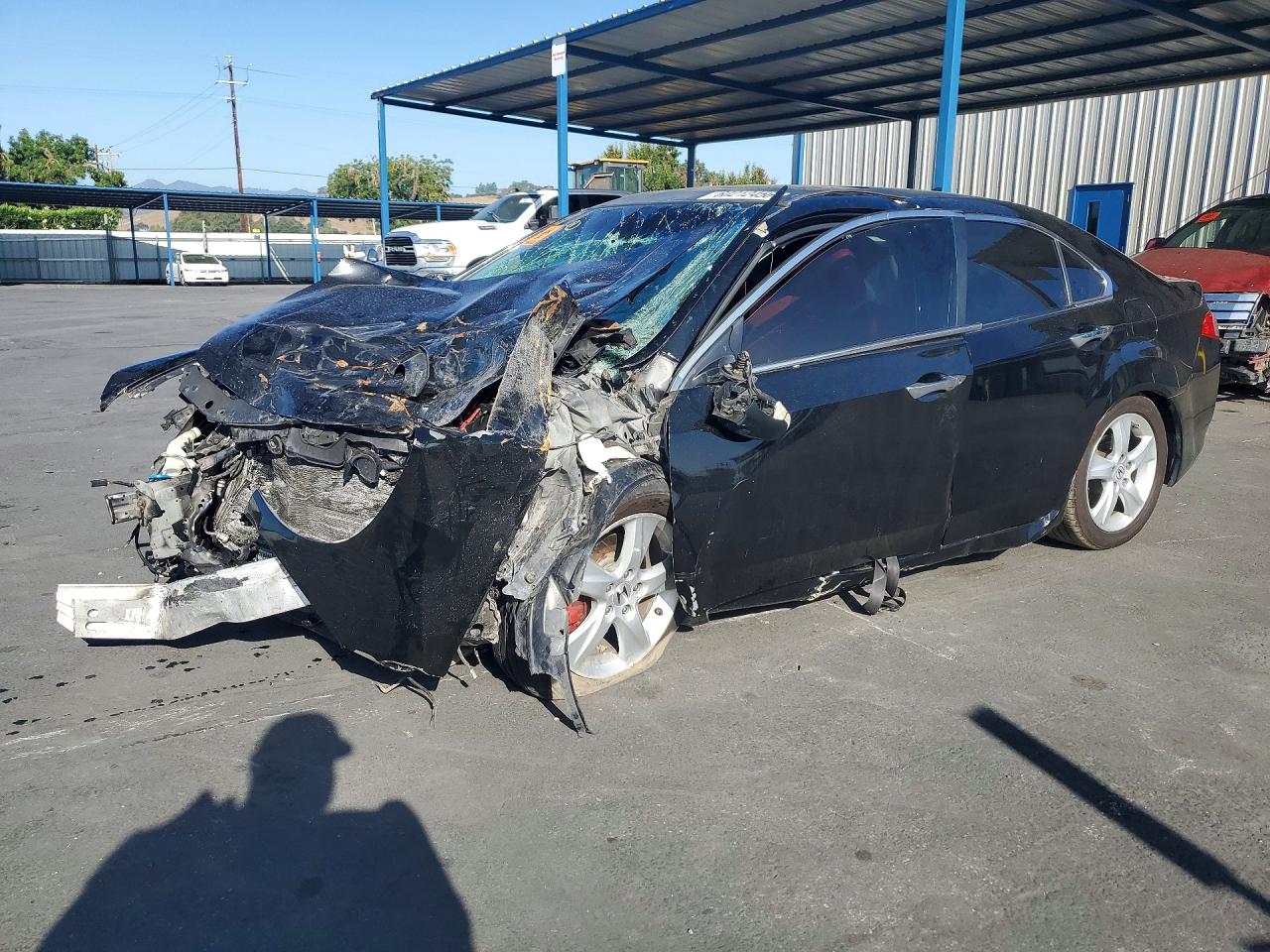 JH4CU2F63AC030990 · 2010 ACURA TSX