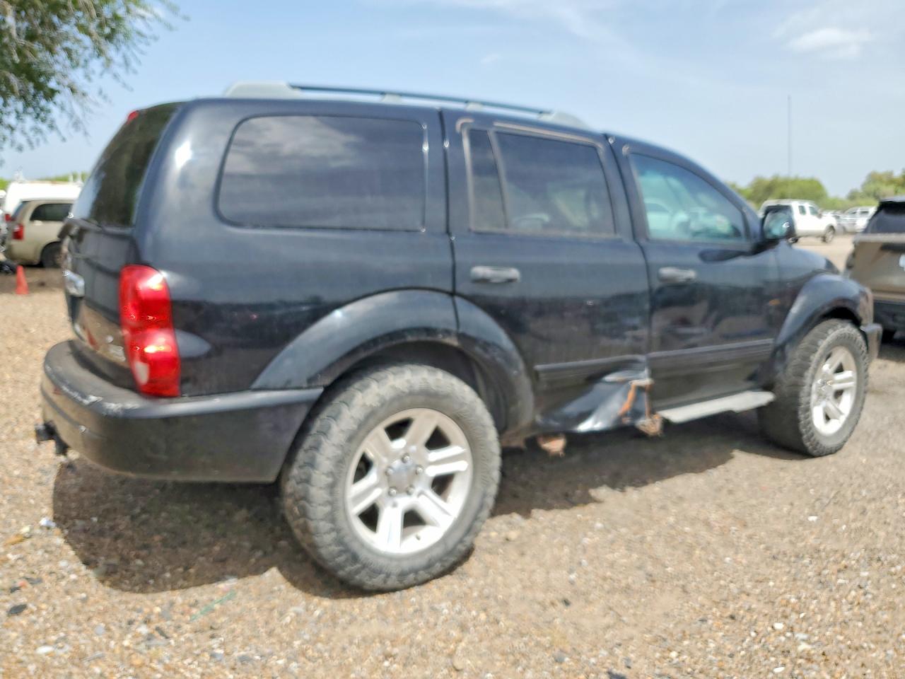 1D4HB48D04F133052 · 2004 DODGE DURANGO · 3/13