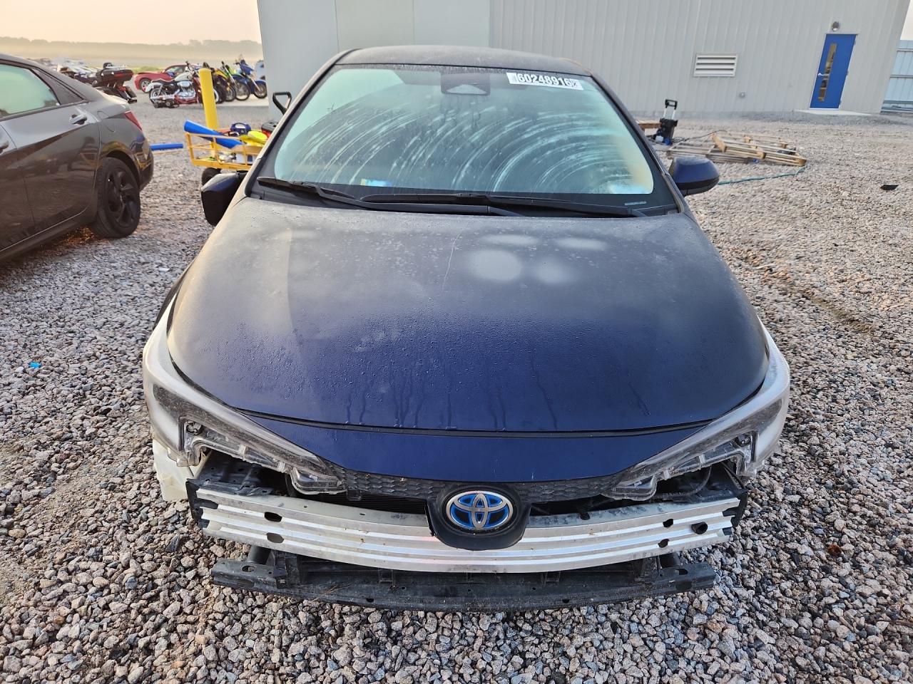 JTDBCMFE3S3090434 · 2025 TOYOTA COROLLA HYBRID · 5/12