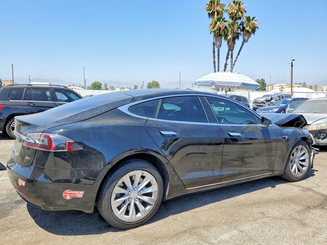 5YJSA1E28JF239840 · 2018 TESLA MODEL S · 3/13