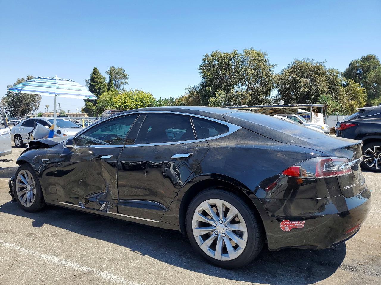 5YJSA1E28JF239840 · 2018 TESLA MODEL S · 2/13