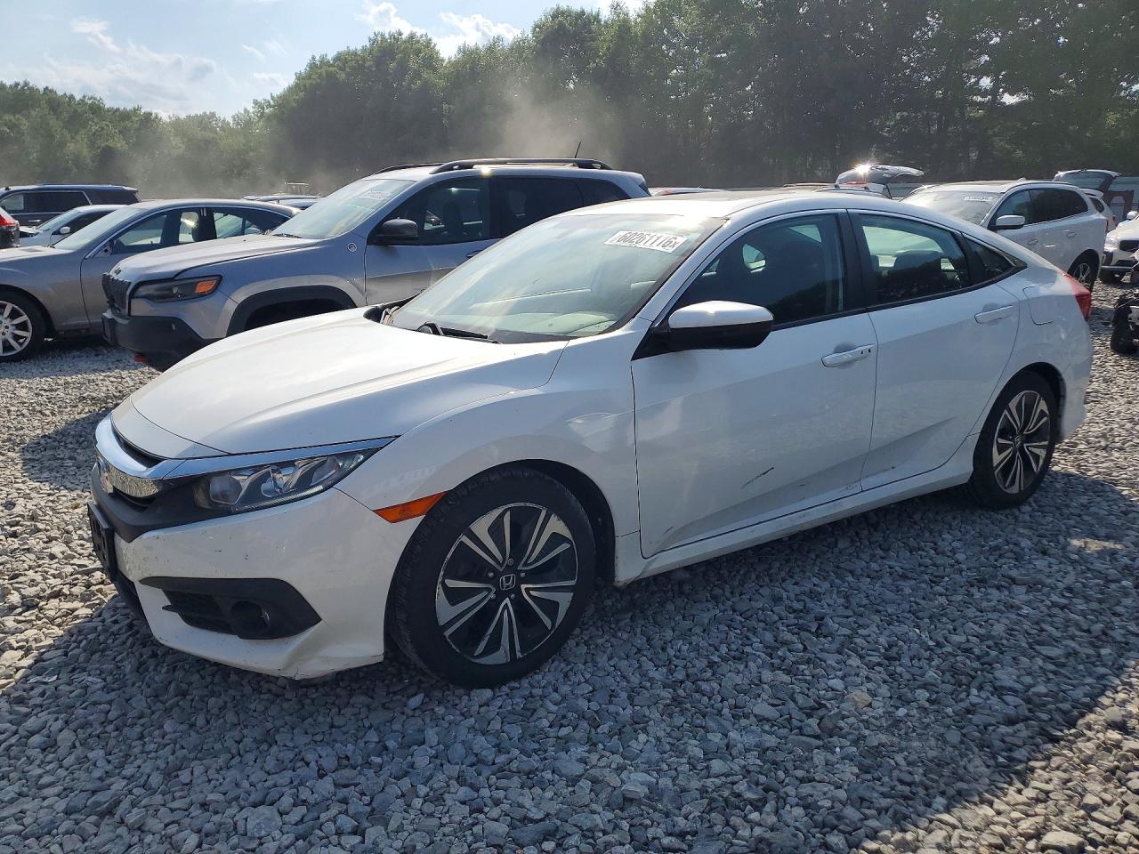 2HGFC1E34JH643248 · 2018 HONDA CIVIC