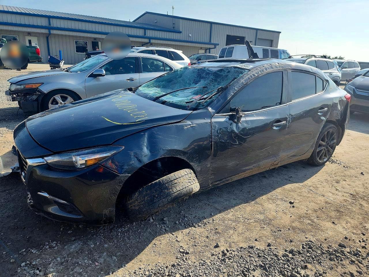 JM1BN1W39H1104154 · 2017 MAZDA 3