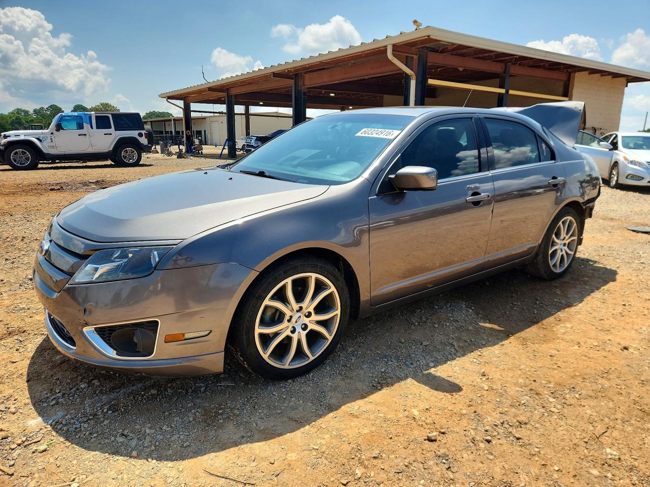 3FAHP0JA4CR141699 · 2012 FORD FUSION