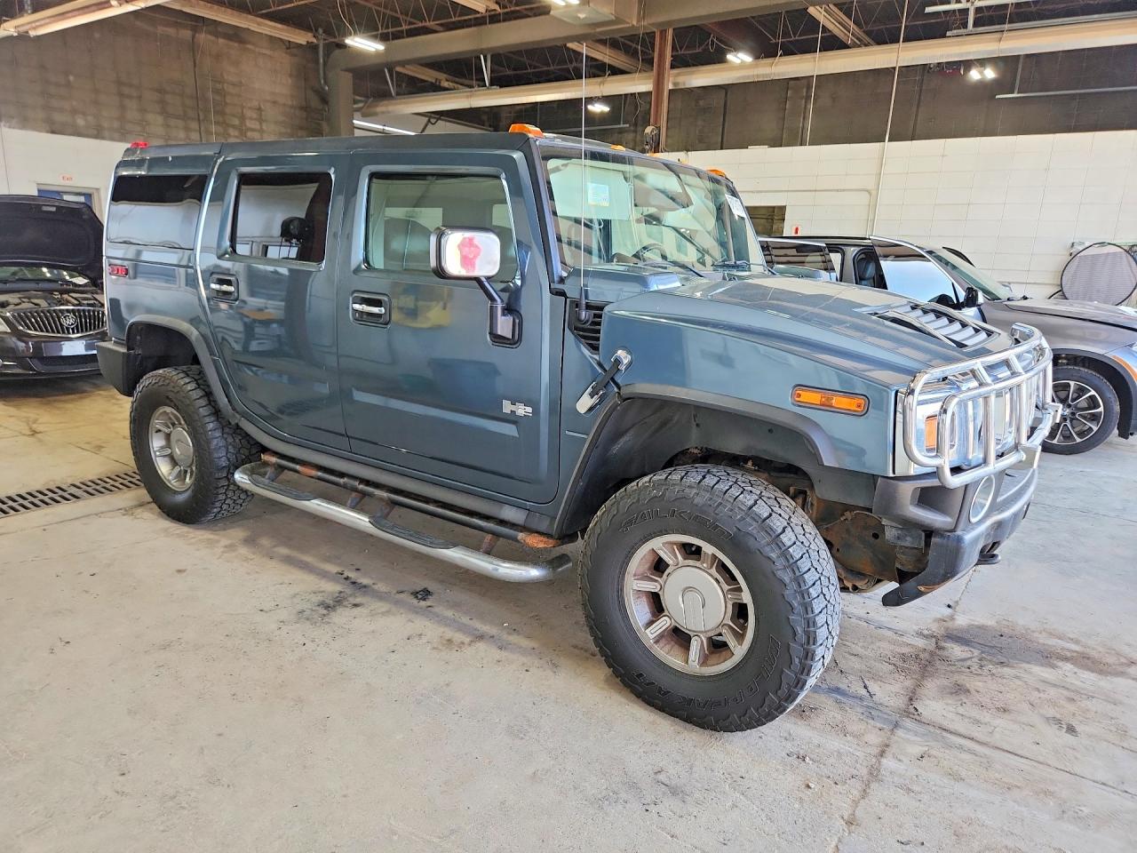 5GRGN23U45H124158 · 2005 HUMMER H2 · 4/13
