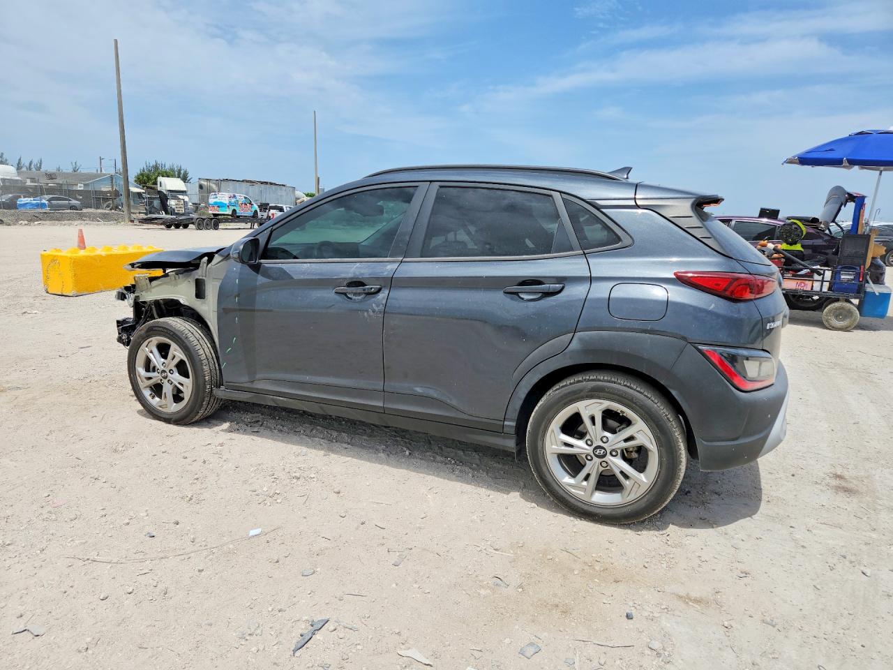KM8K62AB9PU939195 · 2023 HYUNDAI KONA · 2/14