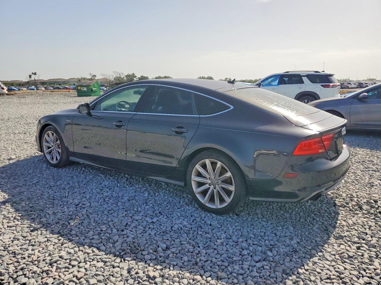 WAU2GAFC1DN061228 · 2013 AUDI A7 · 2/12