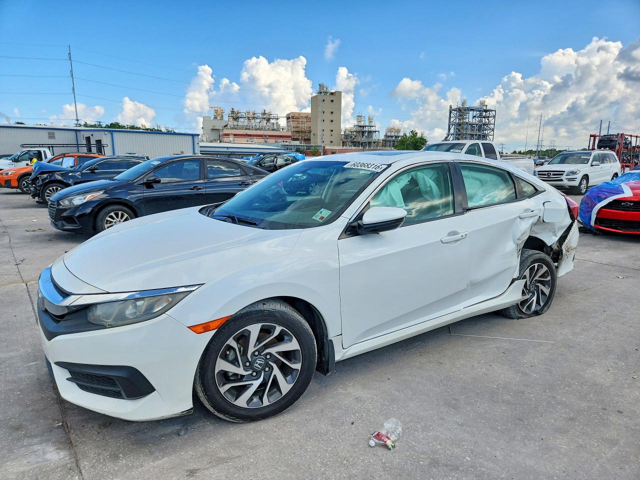 2HGFC2F74JH558157 · 2018 HONDA CIVIC
