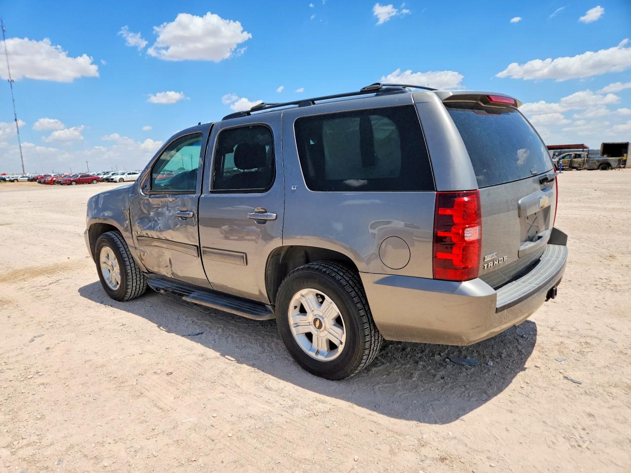 1GNEC233X9R257407 · 2009 CHEVROLET TAHOE · 2/13