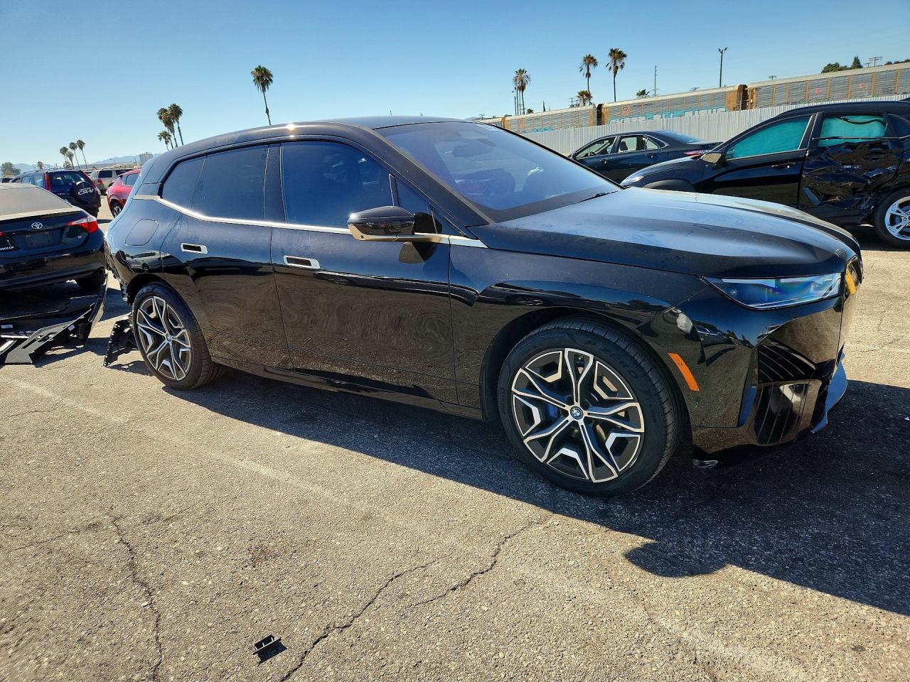 WB523CF06RCN40646 · 2024 BMW IX · 4/14